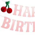 Pink cherry birthday banner with red honeycomb cherries birthday theme from Parte Haus party supply store in Bethesda Maryland