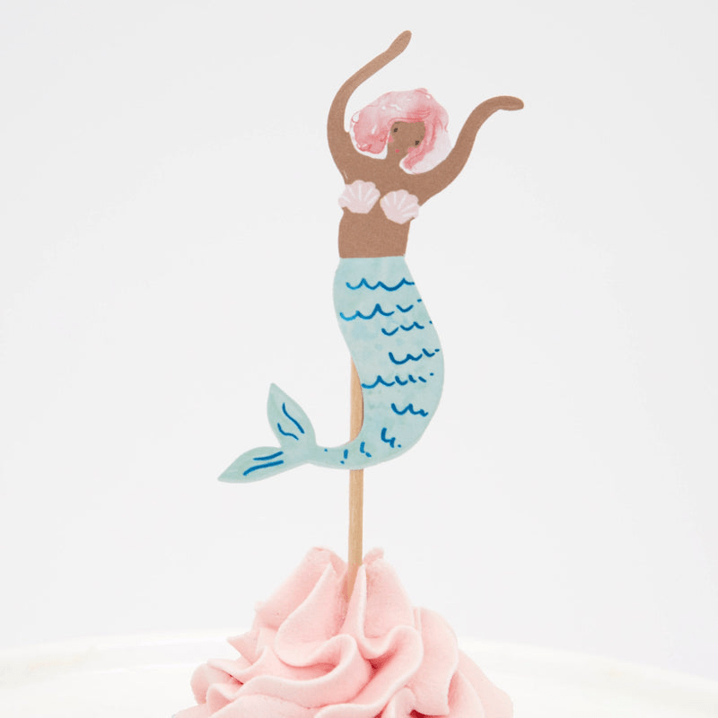 Blue mermaid cake topper with pink hair sea shell top under the sea theme from Parte Haus party supply store in Bethesda MD
