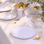 White and gold scalloped plates and cups elegant table decoration for garden brunch at Parte Haus party supply store in Bethesda Maryland
