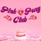 Pink and red banner with cowboy hats and cake western birthday theme from Parte Haus party supply store in Bethesda MD