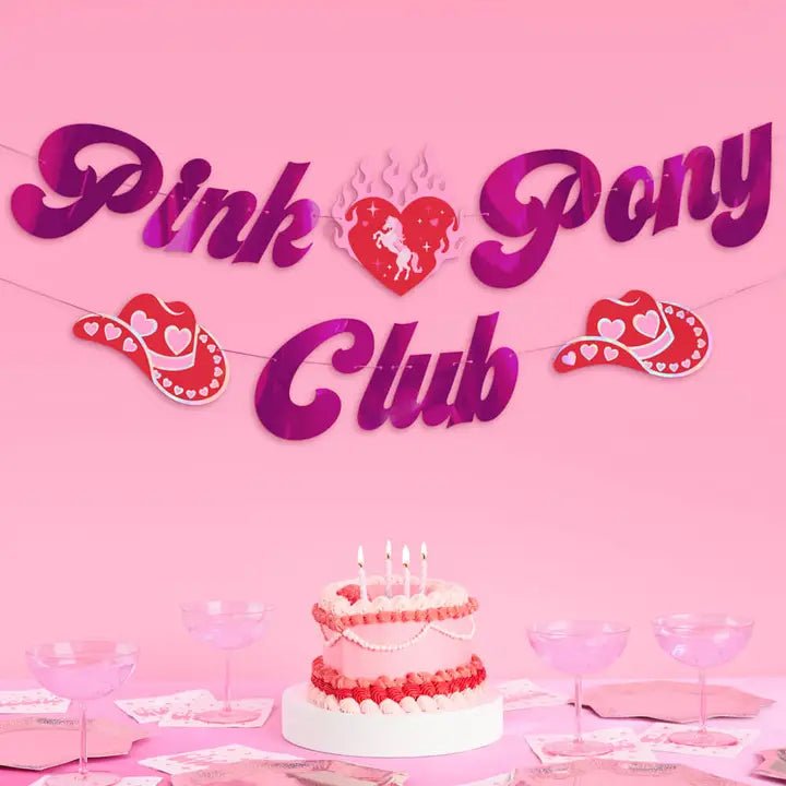 Pink and red banner with cowboy hats and cake western birthday theme from Parte Haus party supply store in Bethesda MD