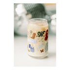 Multicolor custom glass cup with fun sticker icons for celebration theme from Parte Haus party supply store in Bethesda MD.
