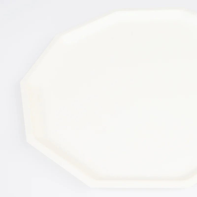 Ivory plate octagonal shape simple design from Parte Haus party supply store in Bethesda Maryland