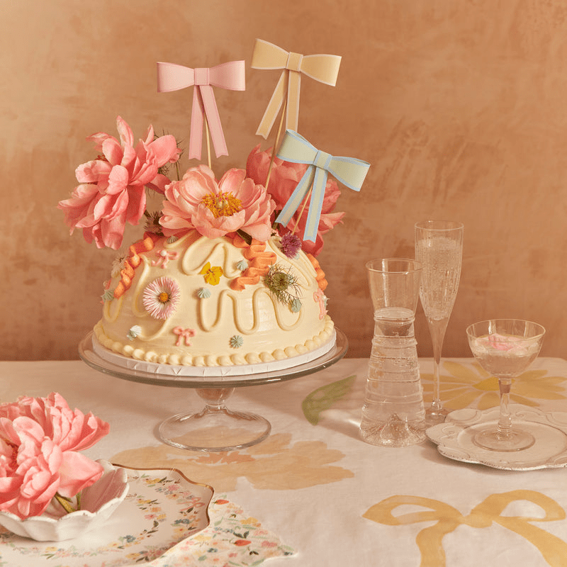 pastel bow cake floral decorations birthday theme from Parte Haus party supply store in Bethesda Maryland