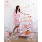 Pink Halloween bar cart pastel desserts and drinks Halloween theme from Parte Haus party supply store in Bethesda MD