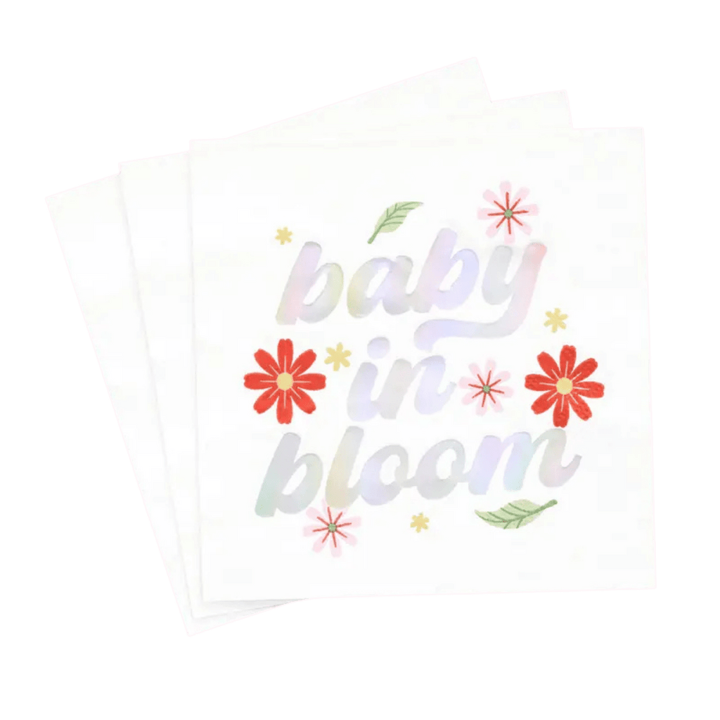 White floral napkin with baby in bloom text baby shower theme from Parte Haus party supply store in Bethesda MD.