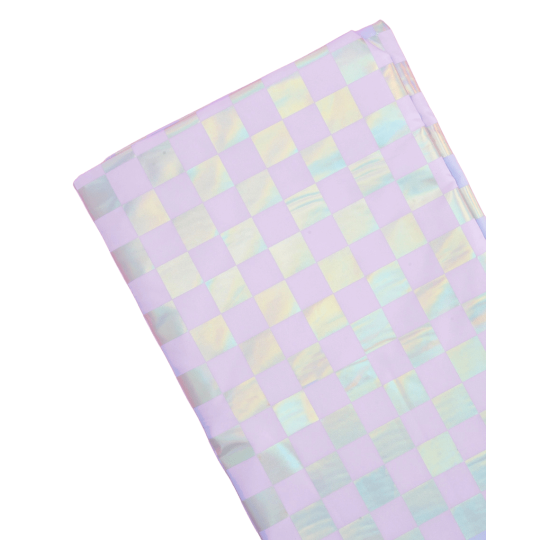 Iridescent checkered tablecloth with pastel tones birthday theme from Parte Haus party supply store in Bethesda MD