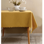 Yellow tablecloth with scalloped edge for modern dinner from Parte Haus party supply store in Bethesda MD