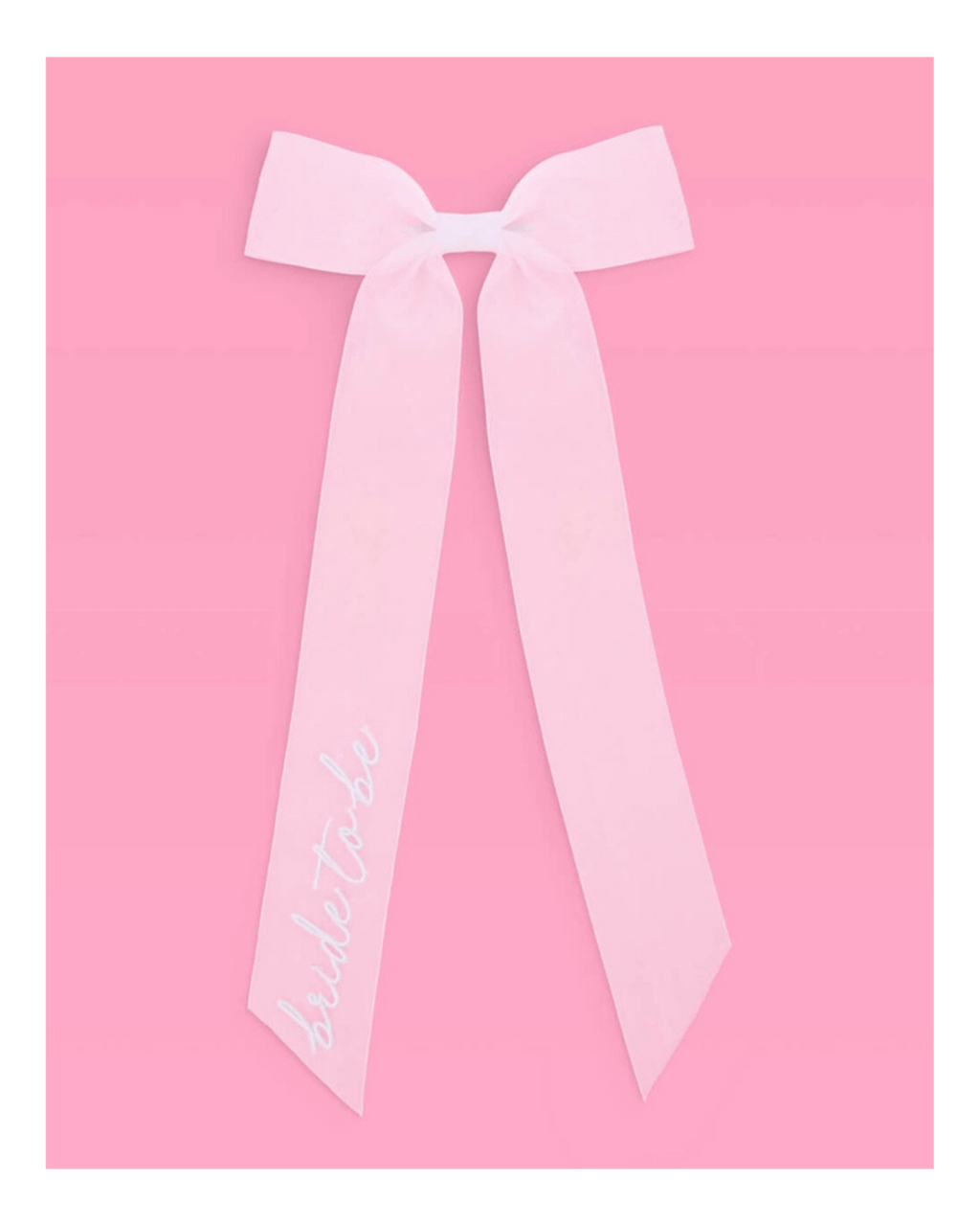 Pink bride to be ribbon bow decoration bridal shower theme from Parte Haus party supply store in Bethesda Maryland