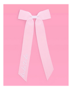 Pink bride to be ribbon bow decoration bridal shower theme from Parte Haus party supply store in Bethesda Maryland