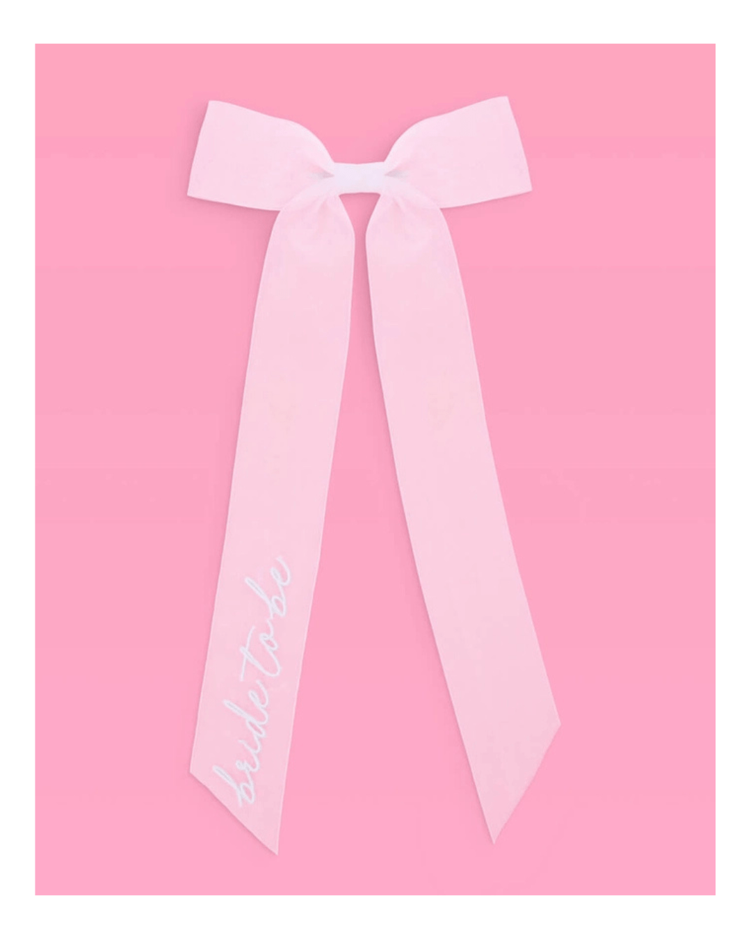 Pink bride to be ribbon bow decoration bridal shower theme from Parte Haus party supply store in Bethesda Maryland