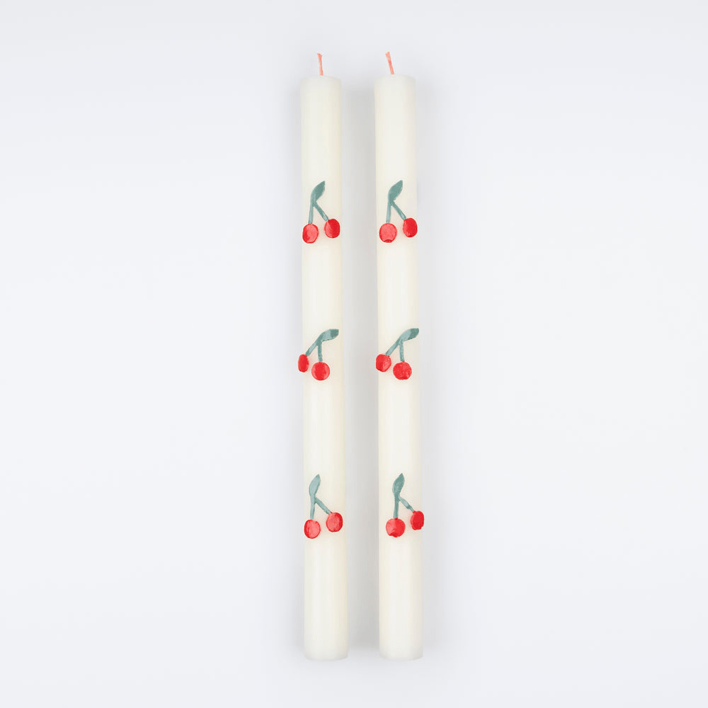 White cherry print taper candles with red cherries for birthday from Parte Haus party supply store in Bethesda Maryland