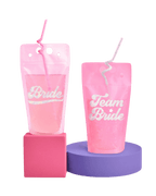 Pink pouch drink bags with straws Bride and Team Bride bachelorette from Parte Haus party supply store in Bethesda MD.