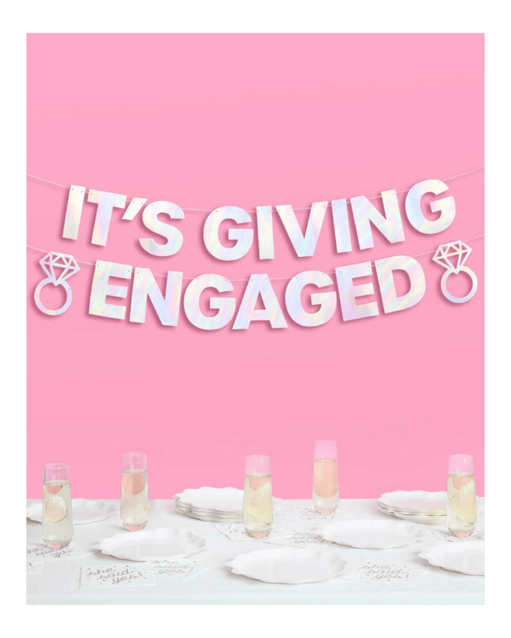 Iridescent engagement banner with diamond ring shapes engagement celebration decor from Parte Haus party supply store in Bethesda Maryland