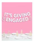 Iridescent engagement banner with diamond ring shapes engagement celebration decor from Parte Haus party supply store in Bethesda Maryland