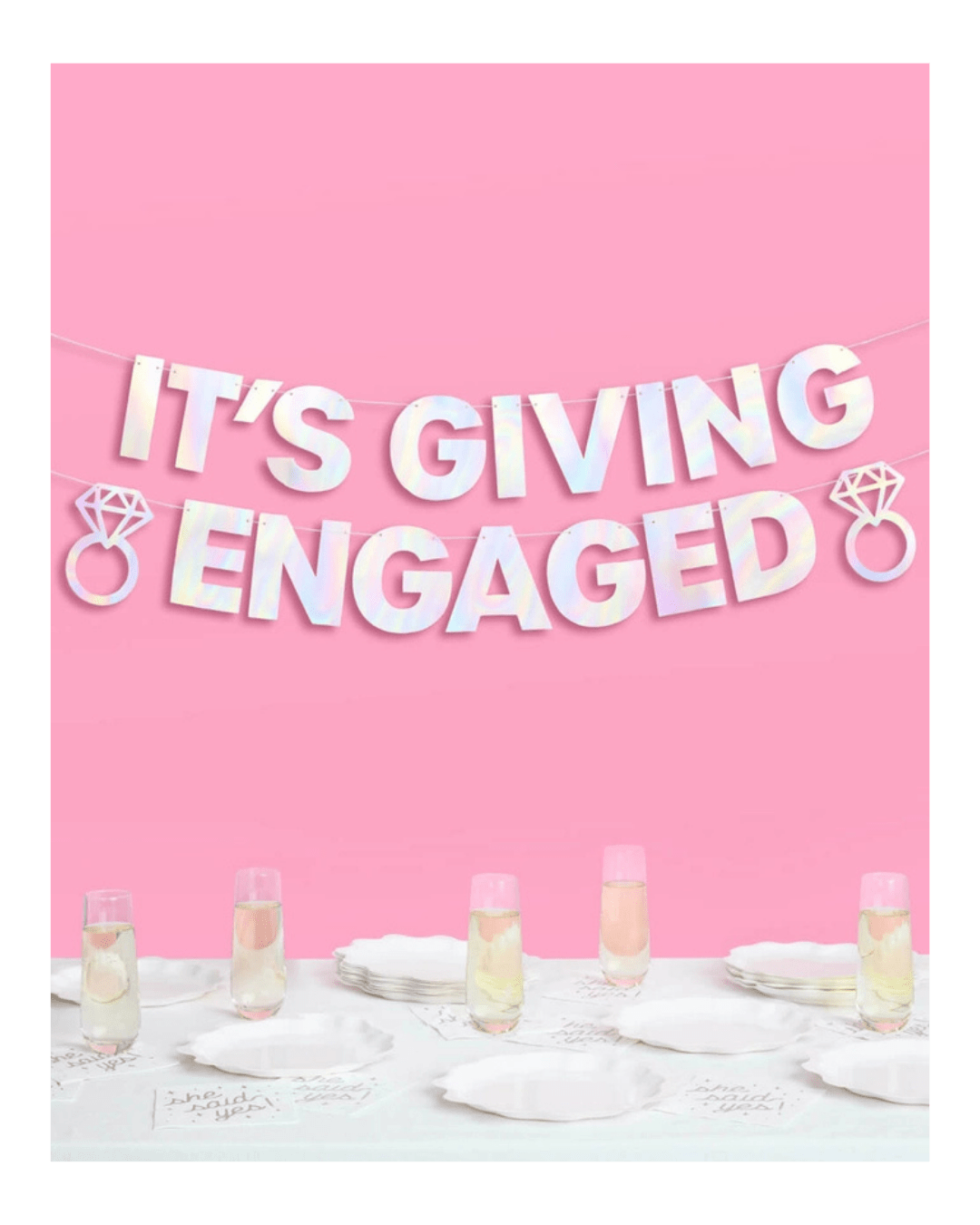 Iridescent engagement banner with diamond ring shapes engagement celebration decor from Parte Haus party supply store in Bethesda Maryland