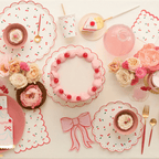 Pink cherry birthday plates and tableware with floral decor and cake celebration from Parte Haus party supply store in Bethesda MD.