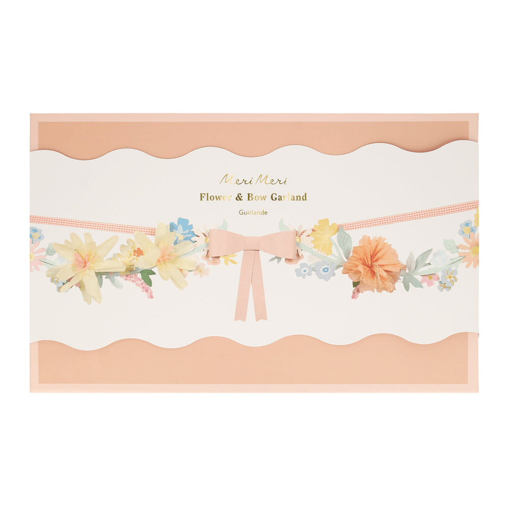 Pastel flower and bow garland with pink ribbon perfect for spring from Parte Haus party supply store in Bethesda MD.