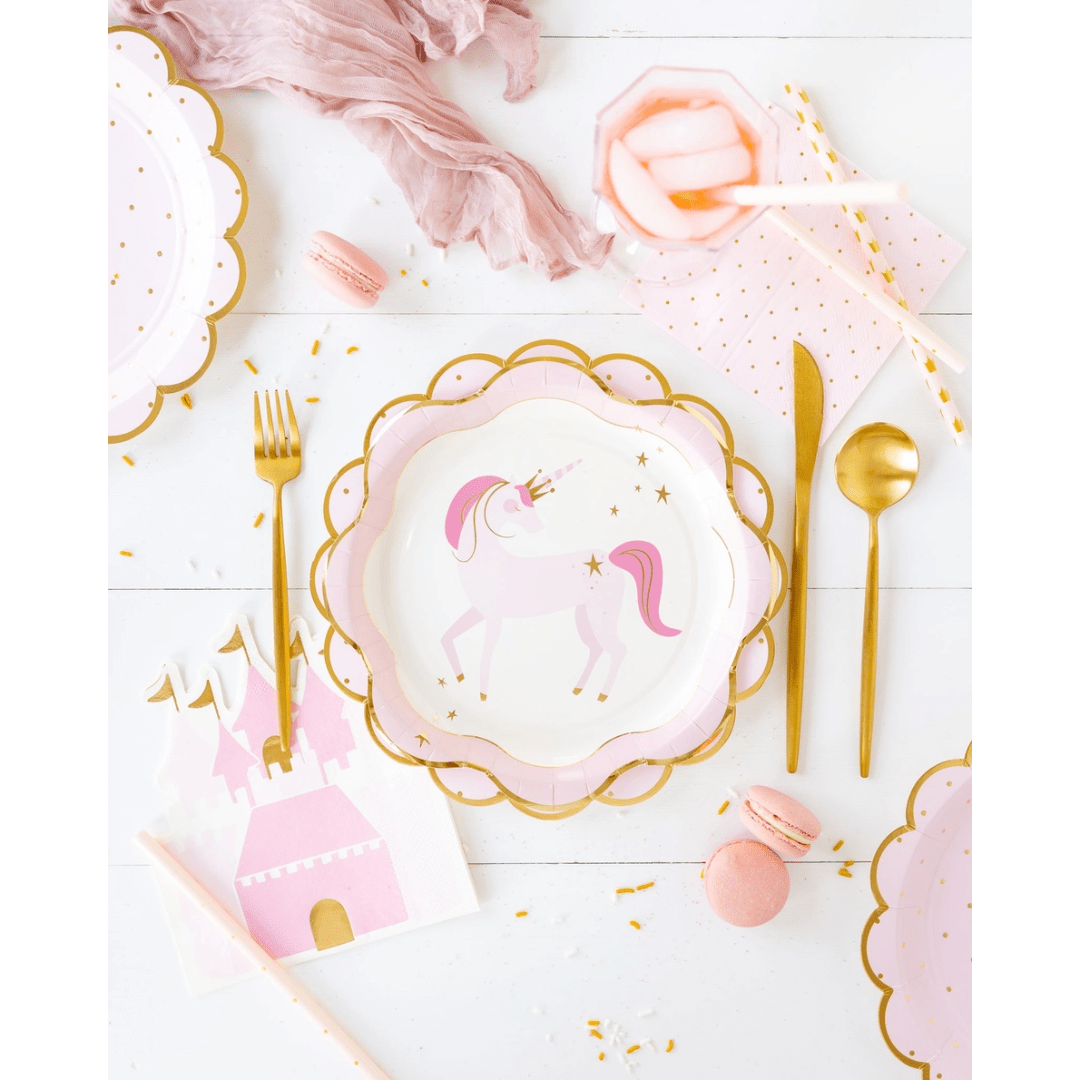 Pink unicorn plate set and castle napkin kids birthday theme from Parte Haus party supply store in Bethesda MD.