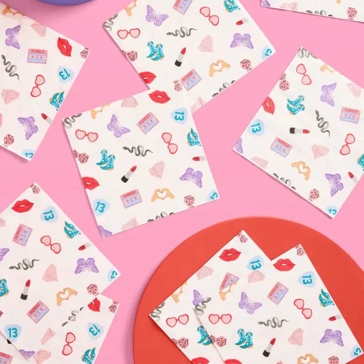 Multicolor napkins with lipstick lips and butterfly prints birthday theme from Parte Haus party supply store in Bethesda, Maryland.