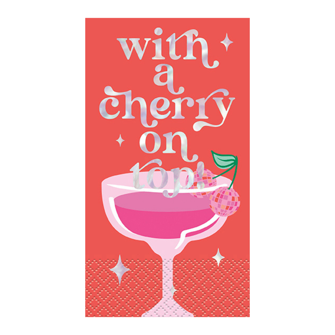 Pink cocktail napkin with silver with a cherry on top text and cherry drink from Parte Haus party supply store in Bethesda MD