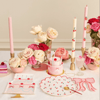 Pink cherry birthday tableware with cake-shaped plates and floral decor birthday theme from Parte Haus party supply store in Bethesda Maryland