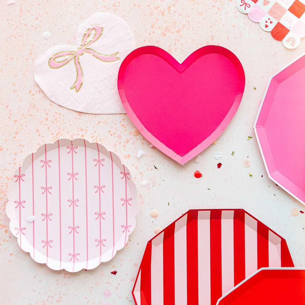 Pink heart plate and pastel paper plates for Valentine's Day from Parte Haus party supply store in Bethesda Maryland