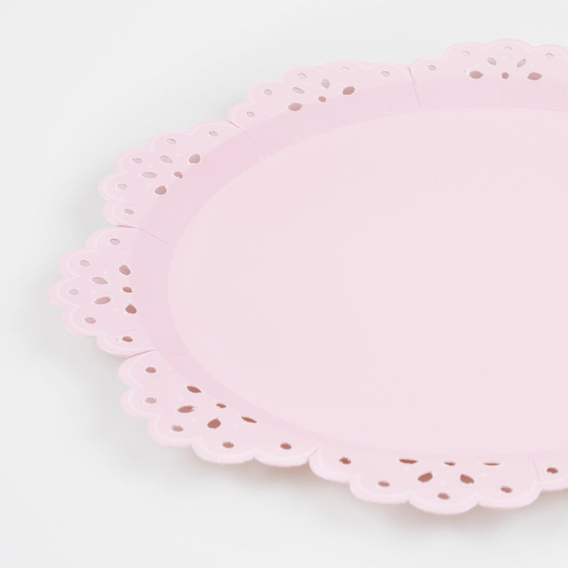 Light pink decorative scalloped plate with cutout edges for birthday from Parte Haus party supply store in Bethesda MD
