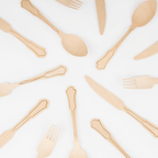 Natural wood utensils set classic engraved design from Parte Haus party supply store in Bethesda Maryland