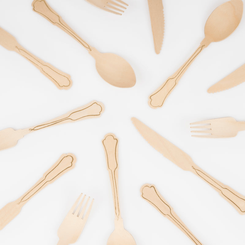 Natural wood utensils set classic engraved design from Parte Haus party supply store in Bethesda Maryland