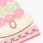 Pink and green cake shaped plate with pastel macaron design birthday theme from Parte Haus party supply store in Bethesda MD