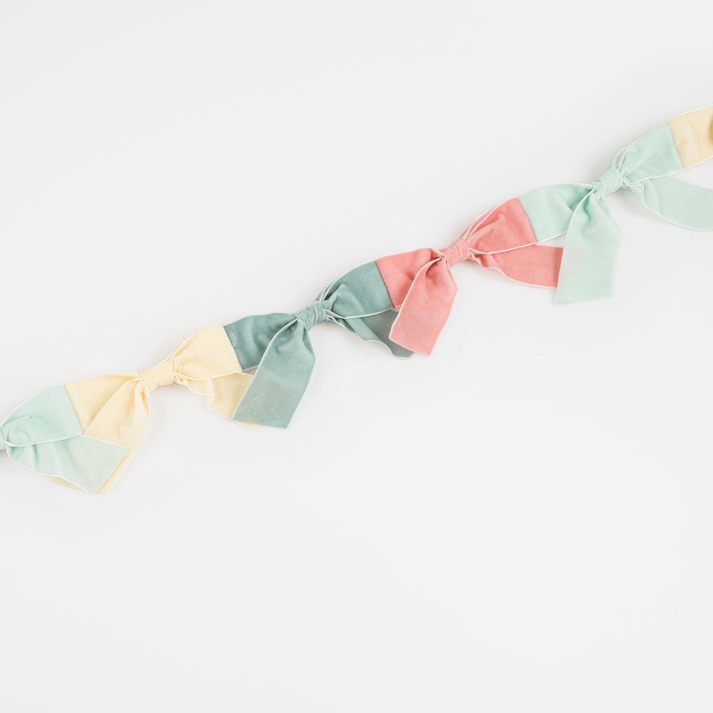 Pastel multicolor bow garland for birthday celebration from Parte Haus party supply store in Bethesda MD