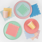 Pastel color plate and cup set with wavy napkins birthday theme from Parte Haus party supply store in Bethesda Maryland