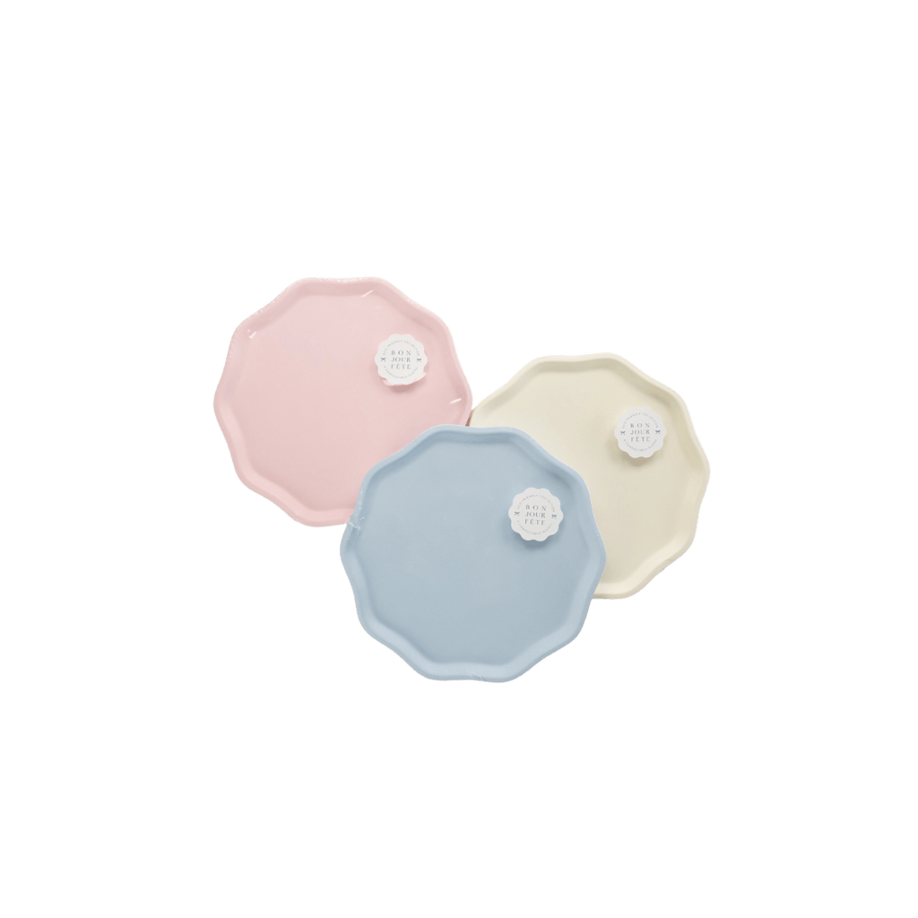 Pastel pink blue yellow scalloped plates modern design birthday theme from Parte Haus party supply store in Bethesda MD.