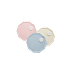 Pastel pink blue yellow scalloped plates modern design birthday theme from Parte Haus party supply store in Bethesda MD.
