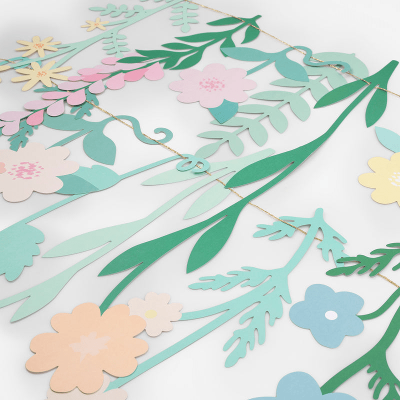 Pastel floral garland with paper flowers and leaves spring theme from Parte Haus party supply store in Bethesda MD