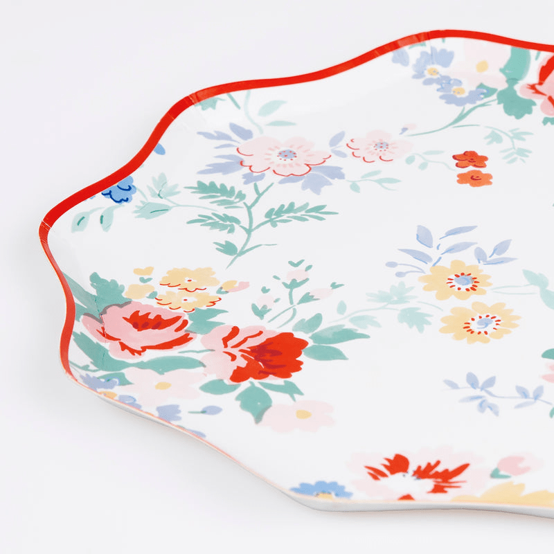 Multicolor floral plate with scalloped edge for spring garden theme from Parte Haus party supply store in Bethesda MD.