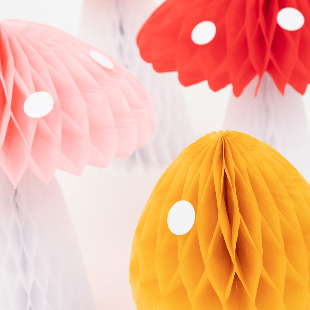Yellow pink and red mushroom honeycomb decorations whimsical theme from Parte Haus party supply store in Bethesda Maryland