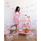 Pink Halloween bar cart with themed treats and balloons Halloween from Parte Haus party supply store in Bethesda MD