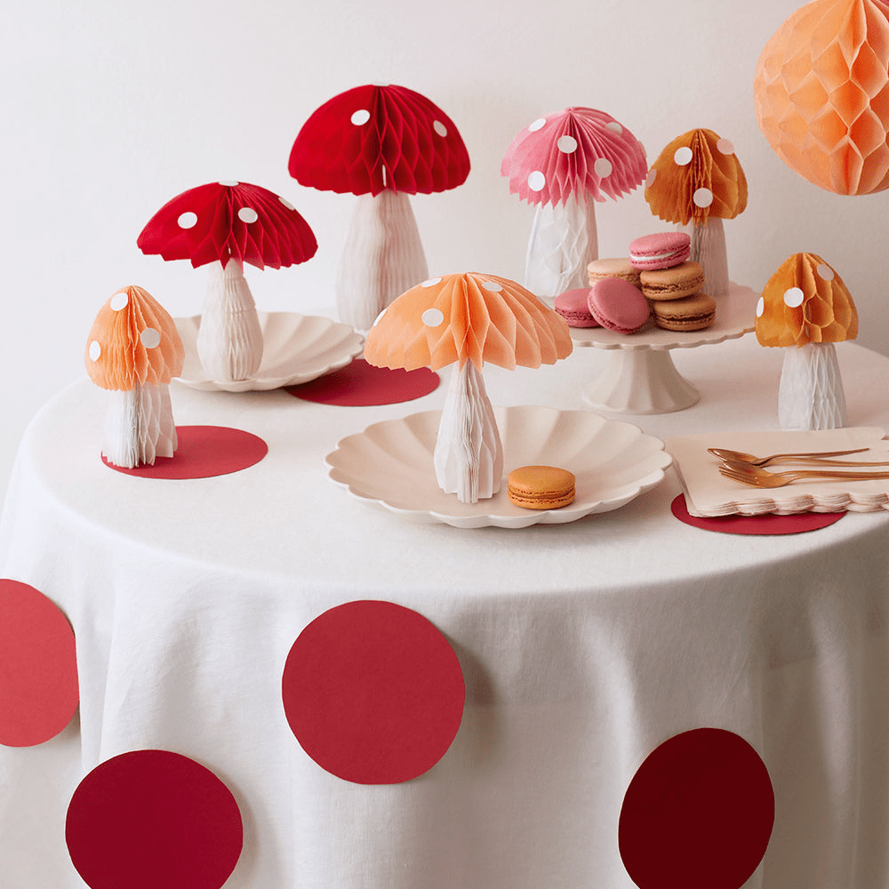 Red pink and orange mushroom paper decorations woodland theme on dessert table from Parte Haus party supply store in Bethesda MD