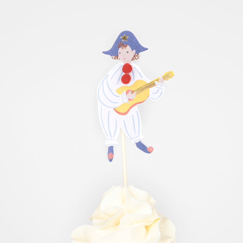 White blue clown cake topper with guitar circus theme from Parte Haus party supply store in Bethesda Maryland.