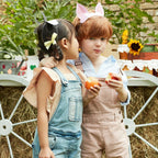 Multicolor farm animal headbands and kids wearing overalls at farm birthday theme from Parte Haus party supply store in Bethesda Maryland