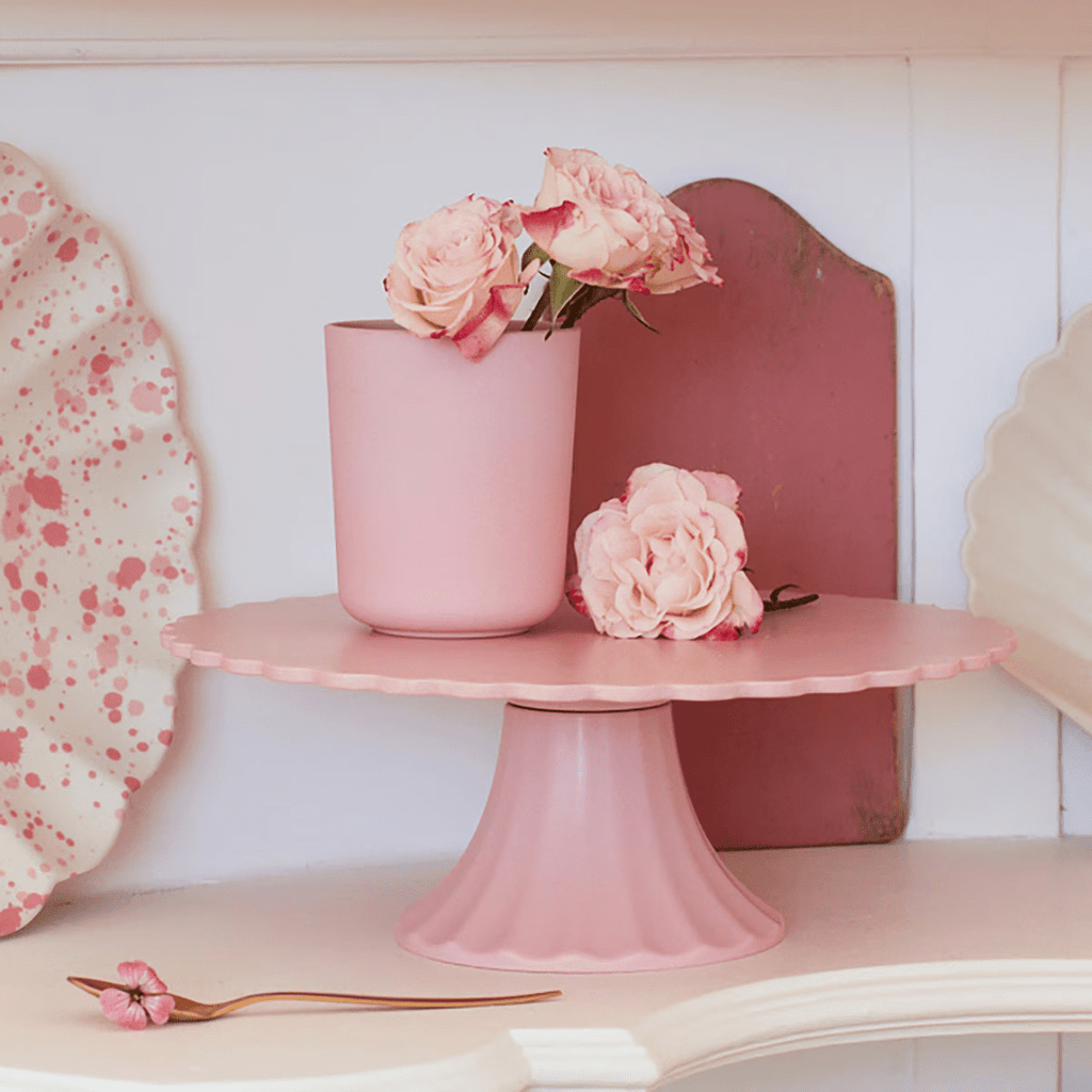 Pink cake stand with roses and blush decor for birthday theme from Parte Haus party supply store in Bethesda MD