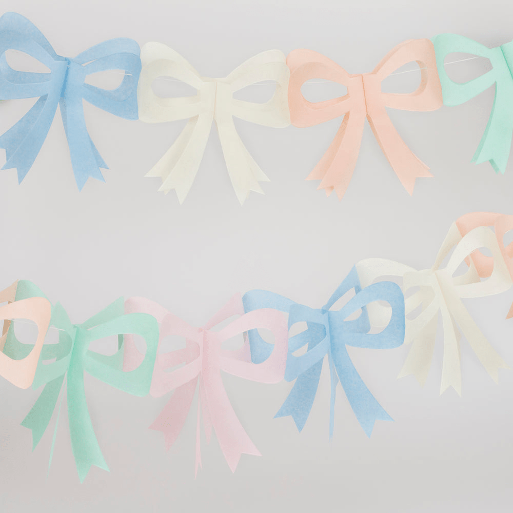 Pastel colored bow garland with cutout design for birthday from Parte Haus party supply store in Bethesda MD