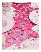 Pink and pastel birthday plates cups and confetti themed table decor for girls party from Parte Haus party supply store in Bethesda, MD.