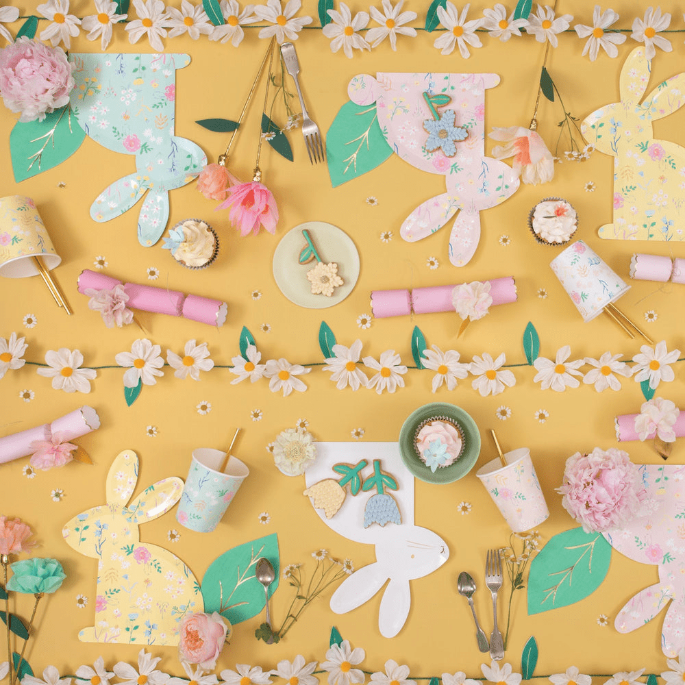 pastel bunny plates floral cups and daisy garland Easter table decor from Parte Haus party supply store in Bethesda Maryland