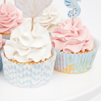 Blue pastel cupcake wrappers with pink and white cupcakes under the sea theme from Parte Haus party supply store in Bethesda MD