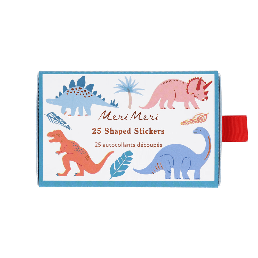 Blue dinosaur shaped sticker box with colorful cartoon dinosaurs birthday theme from Parte Haus party supply store in Bethesda MD.