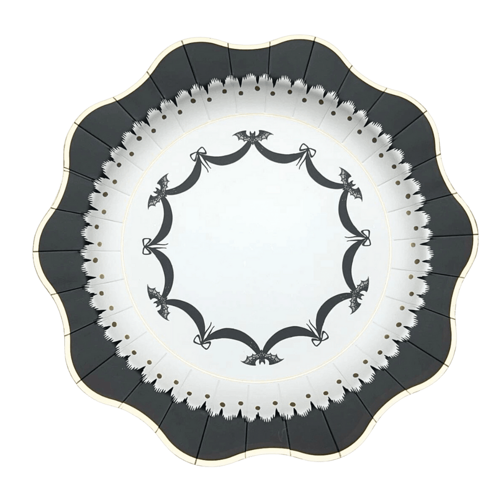 Black and white scalloped edge plate with bat and ribbon design for Halloween from Parte Haus party supply store in Bethesda MD