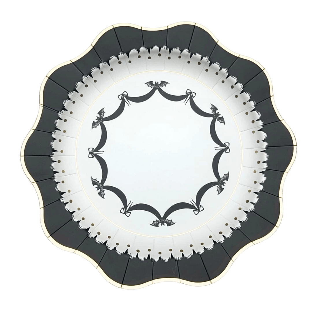 Black and white scalloped edge plate with bat and ribbon design for Halloween from Parte Haus party supply store in Bethesda MD